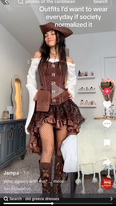 a woman in a pirate costume is posing for the camera