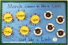 a bulletin board with sheep and lion faces on it, which reads march comes in like a lion out like a lamb