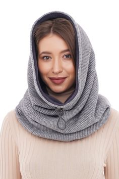 Warm hooded scarf in gray wool/acryl /poliester knit fabric and fleece lining. Wool scarf-hood is an excellent addition to your down jacket or coat. It will serve both as a scarf and as a hood. The contrast pad can be turned inside out, and now you have a new scarf. Product details: Outer side: wool /acryl/polyester knit fabric Back side: fleece Fastener: cotton cord, plastic faster Length- 55cm / 22in Width- 40cm /16in READY FOR SHIPPING Knit Scarves For Cold Weather, Hooded Fleece-lined Balaclava For Winter, Warm One-size Scarves For Cold Weather, Cozy Scarves For Cold Weather, Warm Scarves For Outdoor Fall Use, Winter Scarf For Cold Weather, Casual Gray Winter Scarf, Gray Winter Balaclava For Outdoor Use, Cozy Gray Scarves For Cold Weather