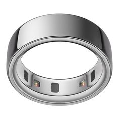 a wedding ring with three stones in the center