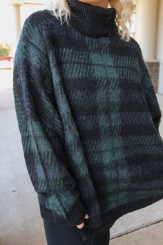 Experience the ultimate comfort and style with our Cozy Spirit Cara Plaid Sweater. Available in 2 beautiful colors, red and green, this oversized turtle neck will keep you warm and trendy all season long. Embrace the cozy spirit and elevate your wardrobe today! Plaid Sweater, 2 Colours, Beautiful Colors, Turtle Neck, Plaid, Wardrobe, Green, Red, Color