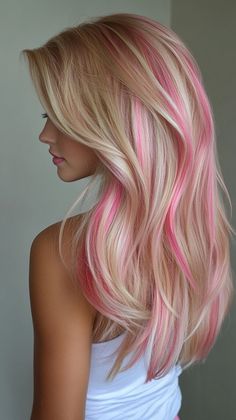 Rock a pink orchid ombre that beautifully complements tan skin. Visit our page for tips on achieving this stunning style. Save this pin for ombre inspiration! Tags: #PinkOrchidOmbre #HairColor #TanSkin Blond To Pink Hair, Blonde Hair With A Pink Streak, Blonde Hair Color With Pink, Pink Highlights Underneath Hair, Pink Highlights In Blonde Hair Curly, Blond Hair With Pink Streaks, Highlights On Blond Hair, Blond Hair Pink Highlights, Blond With Pink Highlights