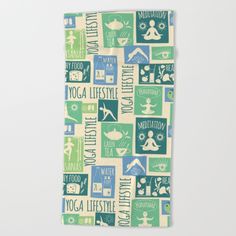 a yoga towel with the words and icons in green, blue, and white on it