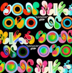 an assortment of colorful circles and letters on a black background with the words cool as silk written below them