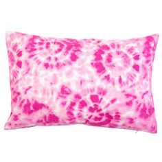 a pink and white tie dye pillow on a white background with the word,'love is