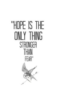 a black and white photo with the words, hope is the only thing stronger than fear