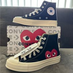 Classic Chuck 70 With A Playful Twist. Unisex High Top Shoe This Style Runs Large (Long) Wear Your Heart On Your Shoes With The Converse X Comme Des Garons Play Chuck 70 Sneaker. This Street-Ready Style Features The Premium Chuck Details You Know And Love, Paired With A Whimsical Heart-And-Eyes Graphic Peeking Just Above The Sole. Eye-Catching Is An Understatement. Why You Should Be Down Canvas Is Lightweight And Durable. Tonal Rubber Toe Cap And Contrasting Heelstay For Standout Style. Lace-Up Love Heart Converse, Converse Heart Shoes, Color Block Converse, Converse Play Comme Des Garcons, Heart Converse, Chuck 70 Converse, Converse X Comme Des Garcons, Eyes Graphic, Converse Play