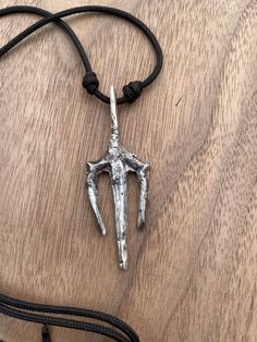 This pure .999 silver trident pendant was cast and hammered to look like it has been weathered by the sea and and scarred in battle. Trident Pendant, Trident Necklace, Clothing Board, By The Sea, Pure Silver, Pendant Necklaces, Favorite Jewelry, The Sea, Jewelry Necklace Pendant