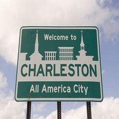 a green and white sign that says charleston all america city