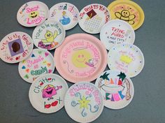 a bunch of paper plates that have different designs on them, all with names and phrases