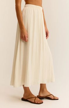 You're going to fall in love with this flowy midi skirt. The elastic waistband makes it so easy to wear and the crinkle fabric adds a slight sheen that sets it apart. Relaxed fit Crinkle Luxe Sheen: 100% Polyester Elasticated waistband Flowy mid length hemline Pleated fabric Hand Wash Cold Separetely, Hang to Dry Midi Design, Flowy Midi Skirt, Work Trip, Crinkle Fabric, Pleated Fabric, Draped Fabric, Fitted Skirt, Clothes Collection, Skirts For Sale