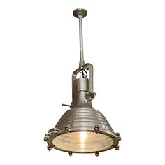 an industrial style light fixture on a white background with clippings to the ceiling