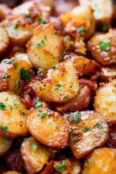 potatoes with herbs and seasoning in a pan