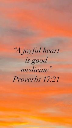 a sunset with the words, a joyful heart is good medicine prove