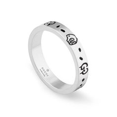 Add a touch of edge to your look with this ring from Gucci. This ring features a repeating engraved GucciGhost motif all the way around the band, a design collaboration with Gucci and artist Trouble Andrew. This ring measures 4mm in width. Made in Italy. This ring is a size 5.75. Gucci Ghost Ring, Ghost Ring, Gucci Ghost, Gucci Jewelry, Matching Ring, Silver Jewelry Design, Jewelry Images, Wedding Rings Vintage, Silver Jewelry Rings