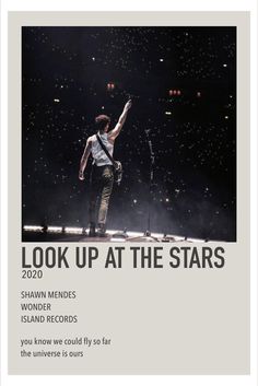 the poster for look up at the stars shows a man on stage with his arms in the air