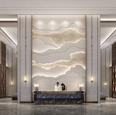 two people sitting at a reception counter in a hotel lobby with clouds painted on the wall