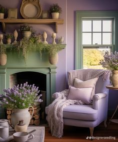 a living room filled with furniture and flowers on top of a fireplace place next to a window