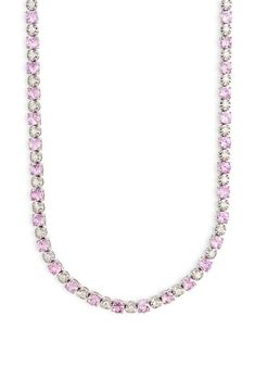 Alternating brilliant diamonds and radiant pink sapphires bring exquisite sparkle to this hand-polished necklace crafted from 14-karat white gold. 16" length; 1/8" width Total pink-sapphire weight: 8.04ct. Total diamond weight: 1.12ct. Color: H Clarity: SI1 14k gold/pink sapphire/diamond Imported >Diamond Guide Elegant Pink Tennis Necklace As Gift, Luxury Pink Sapphire Necklace, Dazzling Pink Sapphire Round Cut Jewelry, Pink Cubic Zirconia Necklace With Prong Setting, Pink Diamond Necklace With Sparkling Stones, Luxury Pink Necklaces With Sparkling Stones, Luxury Pink Necklaces With Diamond Accents, Dazzling Pink Jewelry With Rhinestones, Dazzling Pink Rhinestone Jewelry