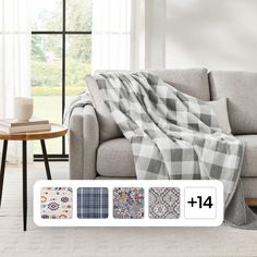 a living room with couch, coffee table and blanket