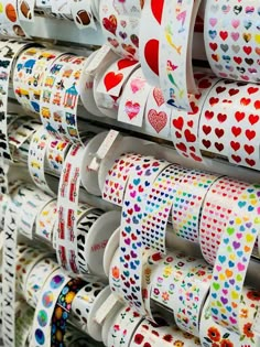 many different colored hearts are on the shelves in this store, and one is for sale