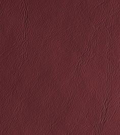 a red leather texture background or wallpaper that looks like it has been painted in different shades