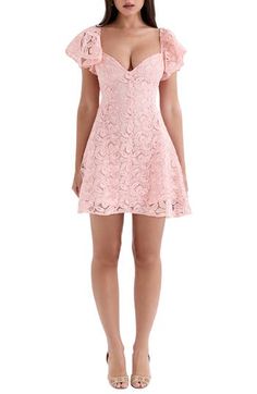 Fluttery short sleeves and a charming sweetheart neckline frame this fabulous floral lace minidress that adds the perfect touch of romance to your going-out look. Exclusive retailer Hidden back-zip closure Sweetheart neck Short sleeves Lined 100% polyester with 80% polyamide, 20% elastane contrast Dry clean Imported Lace Dress With Flutter Sleeves, Feminine Scalloped Lace Mini Dress, Party Mini Dress With Scalloped Lace And Short Sleeves, Pink Lace Mini Dress With Short Sleeves, Feminine Lace Mini Dress, Feminine Short Sleeve Lace Dress With Ruffles, Chic Pink Lace Dress With Short Sleeves, Chic Pink Short Sleeve Lace Dress, Flirty Short Sleeve Lace Dress