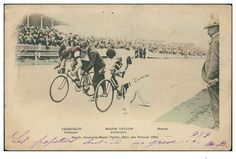 an old black and white photo of men on bicycles in front of a crowd with spectators