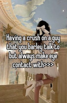 a girl in white dress standing on stairs with the caption having a crush on a guy that you barely talk to but always make eye contact with