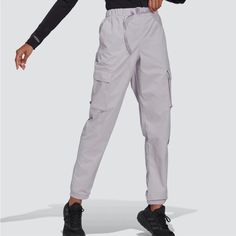 Nwt Adidas Women's Cargo Pants. Belted Elastic Waist With Buckle Closure. 100% Nylon Ripstop. Side Pockets. Cargo Pockets With Flap Closure. Back Pocket With Hook & Loop Closure. Elastic Cuffs. Silver Dawn (Soft Lavender)/Black. Machine Wash. Adidas Cargo Pants, Adidas Cargo, Adidas Sweats, Pants Adidas, Nike Acg Jacket, Adidas Joggers, Training Pants, Women Cargos, Cargo Pants Women