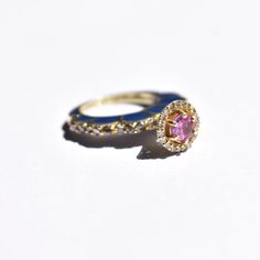 Vintage Royal Pink Sapphire Ring 💍 Metal: Gold Plated Silver. Stones: Sapphire & Diamond Stone Weight - 0.25 carat Stone Shape: Round Stone Size:- Pink Sapphire - Round - 4 mm Diamond - Round - 2mm, 1mm This luxury vintage ring is a true masterpiece. Featuring a stunning round shaped pink sapphire, this ring is a true showstopper. The intricate setting adds to the overall elegance of the piece, while the gold metal combination adds a touch of glamour. Handmade with natural gemstones, this ring Real Diamond Ring, Royal Rings, Royal Pink, English Vintage, Real Diamond Rings, Costume Jewelry Rings, Pink Sapphire Ring, Enamel Ring, Vintage Ring