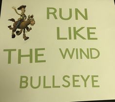 a sign that says run like the wind bullseye and has an image of toy story characters on it