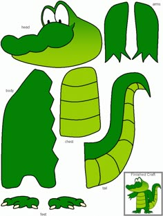 an alligator cut out from paper with the head, tail and feet in green color