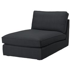 a black chaise lounge chair sitting on top of a white floor