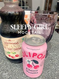 two bottles of sleepy girl mochail and a can of cherry soda on a counter