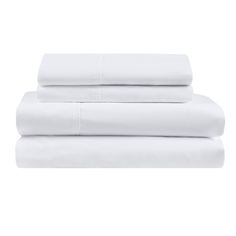 the white sheets are folded on top of each other