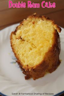 a slice of cake on a plate with the words double rum cake written above it