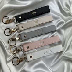 This personalised keychain is the perfect small gift for all occasions or a special treat for yourself. This item is so versatile and can also be used as a luggage or bag charm.  Available in Black, Grey, White, Pink. Add that special touch by personalising with your name/ initials in either Silver or Gold or Rose Gold (personalisation max 7 characters). Materials:  PU Leather Size: 14cm x 3cm plus clasp & ring  Hardware is gold as per the photos and cannot be changed  Please note, stamping may Personalised Keychain, Loop Keychain, Keychain Custom, Keychain Bag, Wristlet Keychain, Personalized Keychain, Keychain Gift, Luggage Tag, Luggage Tags