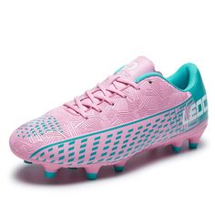 a pink and blue soccer shoe with spikes on the bottom, in front of a white background