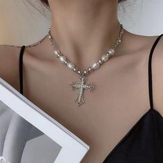 Our cross pearl necklace, suspended from a 39cm chain, exudes an air of elegance. Its refined design makes it an ideal gift for special occasions, delivered right to your doorstep in an exquisite gift box. Chain length 39cm (15inch) Elegant design Shipped with gift box Y2k Black Aesthetic, Y2k Blue Aesthetic, Y2k Pink Aesthetic, Fashion Forward Outfits, Aesthetic Clothing Stores, Cross Chain, Cross Jewelry, Red Aesthetic, White Aesthetic