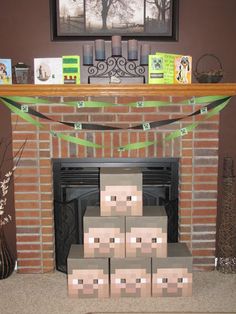 cardboard boxes stacked on top of each other in front of a fireplace with decorations around it