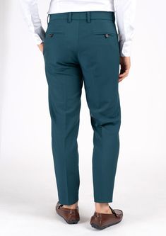 Boldly refined and fashion forward, the Diamantia Teal Stretch Pants are crafted from unique stretch cotton fabric for extra comfort in an eye-catching and polished color that's sure to get attention. Fitted Green Chinos With Welt Pockets, Fitted Green Tapered Leg Chinos, Fitted High-waisted Cotton Chinos, Fitted Green Cotton Chinos, High-waisted Cotton Chinos, Slim Fit Cotton Bottoms With Wide Leg, Elegant Long Cotton Pants, Slim Fit Wide Leg Cotton Bottoms, Fitted Cotton Dress Pants With Tapered Leg