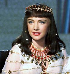 an image of a woman wearing a tiara and jewelry on the set of star trek