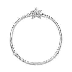 Bring celestial sparkle to your look with the Pandora Moments Asymmetric Star Clasp Snake Chain Bracelet. Hand-finished in sterling silver, the bracelet's star-shaped clasp is covered by sparkling clear cubic zirconia pavé on both sides. It can be worn with up to 16-18 desired charms and clips. Wear it on its own for a simple, understated look, or stack it with other celestial-inspired designs for a look that’s out of this world. Charms Pandora, Golden Trio, Bracelet Pandora, Cz Bracelet, Bracelets Design, Snake Chain Bracelets, Pandora Bracelet Charms, Precious Jewels, Jewelry Lookbook