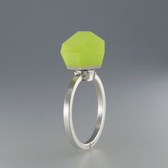 This ring has been carefully handcrafted in our workshop.  it has been designed to comply with our modular concept,  an idea that allows building and customising your own jewellery pieces.  this ring consists of two modules: top: vu crystals 8mm neon yellow acrylic resin crystal + ring band: minimal ring sterling silver  the top and the ring band are already assembled and the ring is ready to dazzle.  to swap your ring top you simply need to unscrew it by hand and replace with an alternative mod Neon Yellow Tops, Minimal Ring, Yellow Rings, Yellow Top, Crystal Ring, The Crystals, Crystal Rings, Ring Band, Gold Plated Silver