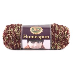 a ball of yarn with the words homespun on it in brown and red