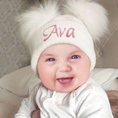 Please note:  Hat is universal size: Maximum Head Circumference: 50CM (19.68 INCH) Keep your baby warm and stylish with our adorable personalized double faux fur pom pom hat! This season's must-have accessory features a universal size, fitting head circumferences up to 50cm (19.68 inches). Crafted with love, this lightweight hat offers warmth without adding pressure, making it perfect for your little one. Add a special touch with custom embroidery, making it a unique gift for baby showers and ne White Adjustable Beanie For Babies, White Embroidered Beanie Hat, Cute White Hat For First Birthday, Cute White Knitted Bonnet, Cute White Knitted Hat, Cute White Knitted Beanie, Cute Cream Knitted Hats, Cute Personalized White Hat, Playful White Cap Beanie