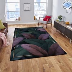 a living room with wooden floors and large rugs on the floor in front of a window