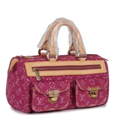 This Vintage Neo Speedy is in Pink Monogram Denim with gold hardware, contrast stitching, vachetta handles, trimming on front and back, two rounded top handles, internal slip pocket, internal logo patch, front zip-fastening pocket, and two front flap pockets.The interior is lined in pink microfiber.Origin: FranceCondition: Vintage; Never - some slight storage wear is present. Accompanied by: Louis Vuitton dustbagMeasurements: 12" width x 6.5" height x 6" depth; 3" handle drop Dream Bags, Pink Monogram, Pink Denim, Denim Bag, Vintage Louis Vuitton, Hermes Bags, 3d Projects, Handbag Backpack, Dior Bag