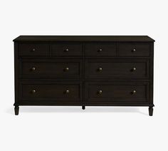 a black dresser with gold knobs on the top and bottom drawers, against a white background